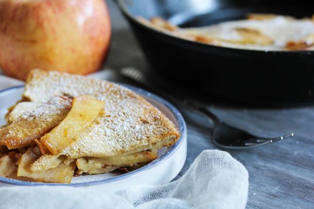 istock Apple popover  slices in a white plate - fall and christmas food 940442368