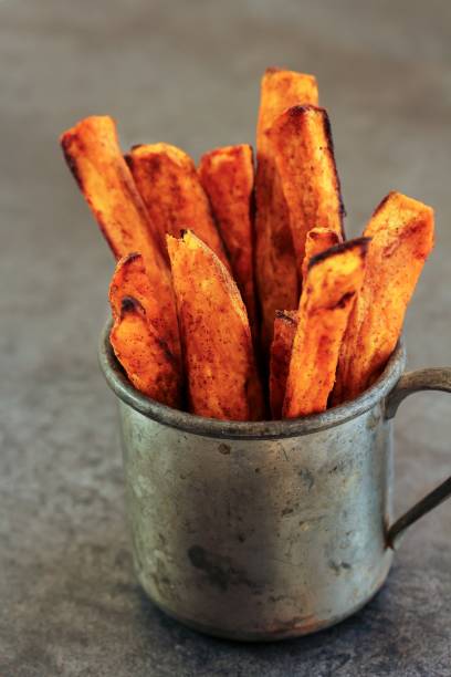 istock Baked sweet potatoe wedges 940442714