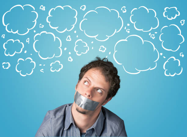 istock Funny person with taped mouth 940442766