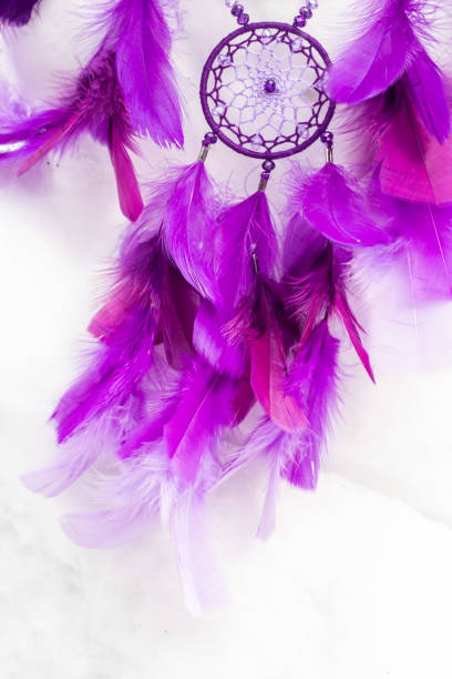 istock Handmade dream catcher with feathers threads and beads rope hanging 940447038