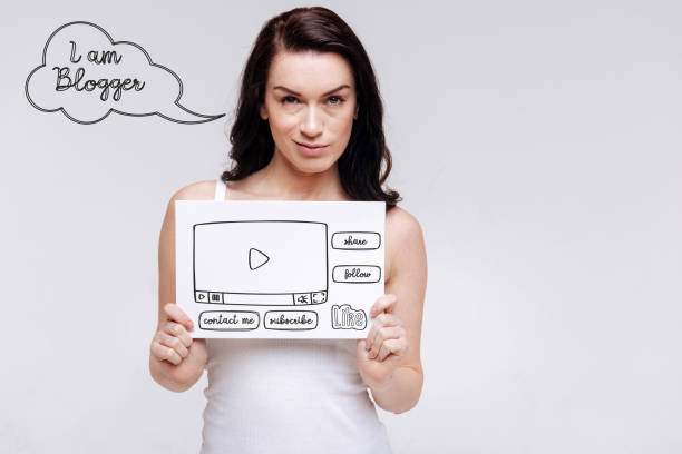 istock Beautiful woman looking confident while dreaming about being a blogger 940450066