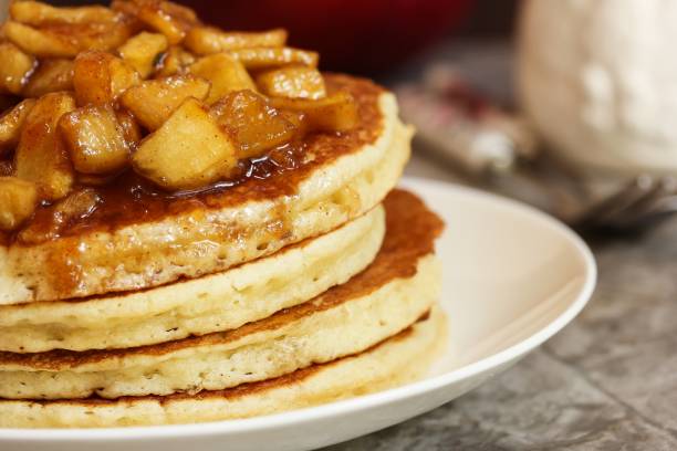 istock Pancakes with caramelized apple topping and syrup 940451578
