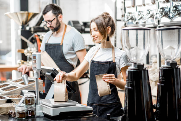 istock Coffee sellers working in the shop 940451696