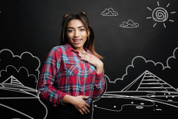 istock Positive woman feeling good while remembering her amazing trip to Egypt 940451714