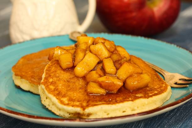 istock Pancakes with caramelized apple topping and syrup 940454284