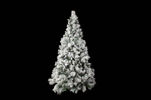 istock Beautiful white christmas tree isolated on a black background 940454658
