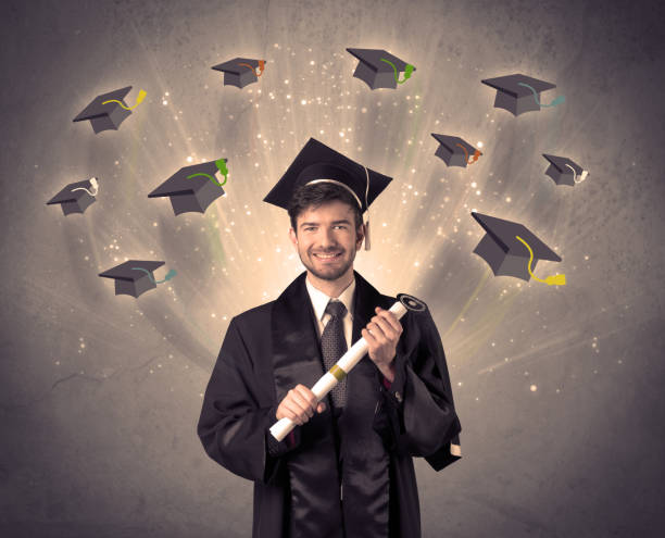 istock College graduate with many flying hats 940455654