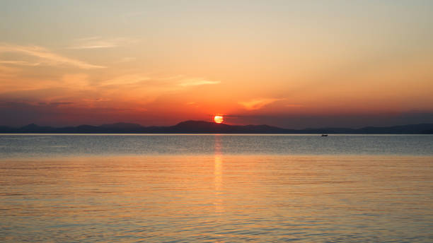 istock Panorama of a beautiful sunset at the sea 940457988