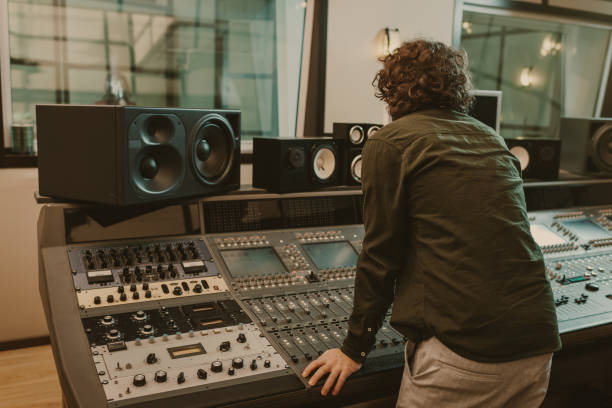 istock young sound producer working at recording studio 940461280