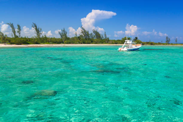 istock White boat on the turquise Caribbean Sea 940462336