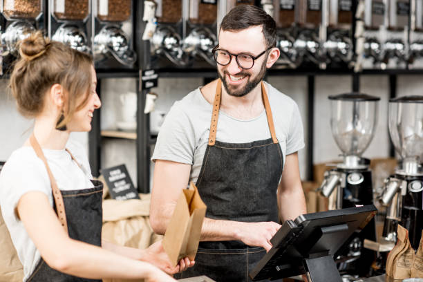 istock Coffee sellers working in the shop 940462828