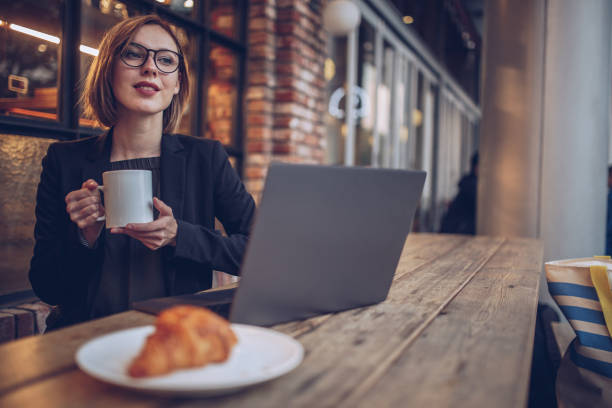 istock Young woman working in the coffee shop 940463356