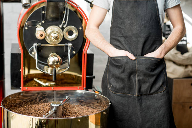 istock Barista near the coffee machine 940468866