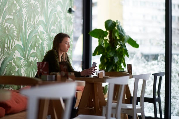 istock Woman in coffee shop 940468934