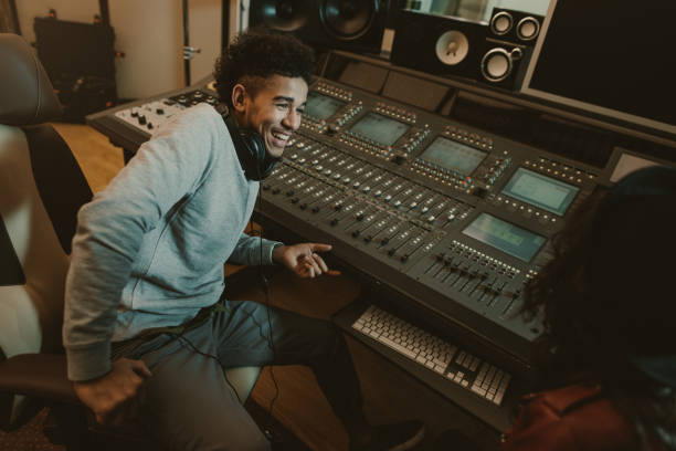istock happy young sound producer sitting at studio 940469042