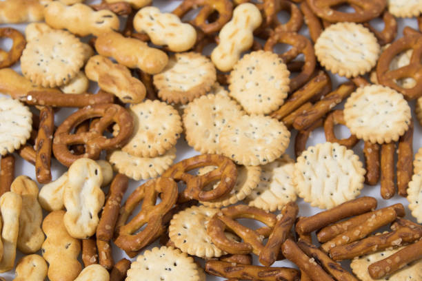 istock Snack salty mix in a white background composition 940505448