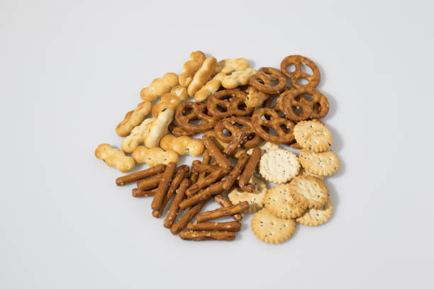 istock Snack salty mix in a white background composition 940513028