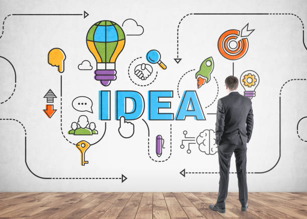 istock Rear view of a businessman looking at idea 940513134