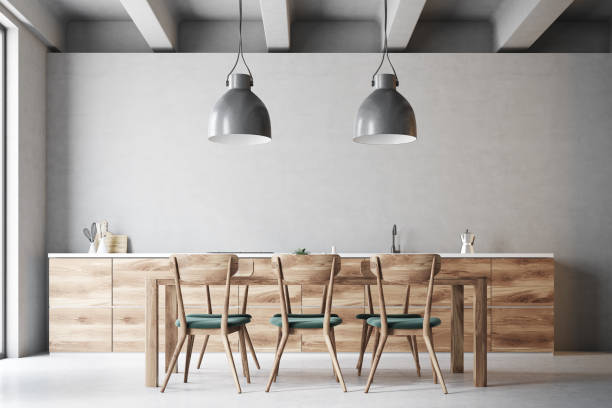 istock Wooden dining table with design chairs 940515226