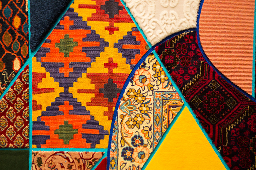 Detail patchwork colorful carpet close up texture background