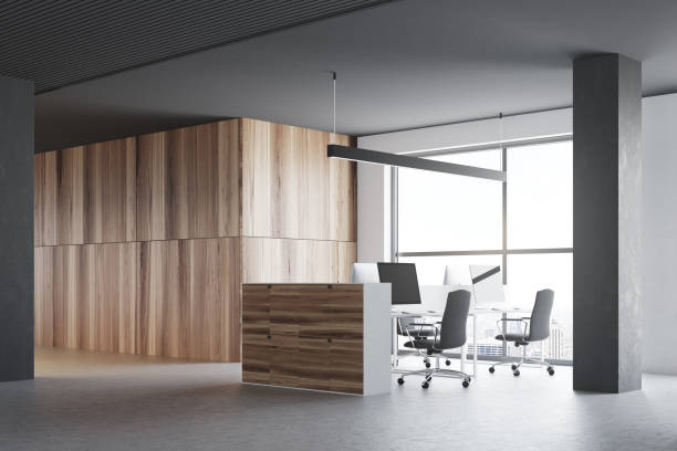 istock Gray and wooden office cubicles, side view 940515806