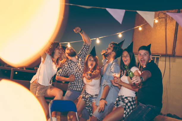 istock People dancing at a rooftop party 940519144