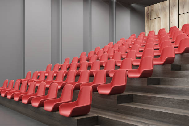 istock Cinema interior corner, red chairs, gray 940519438
