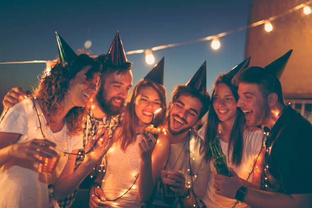 istock Blowing the candle on a birthday cake 940521152