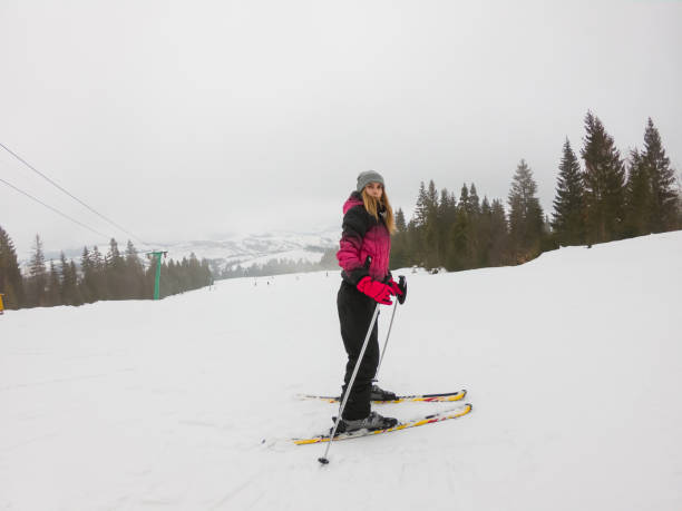istock A young girl skiing in the mountains 940523478