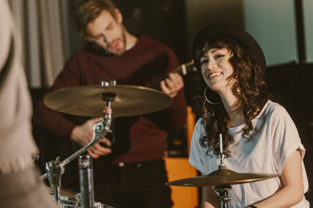 istock happy young female drummer on repetition 940523682
