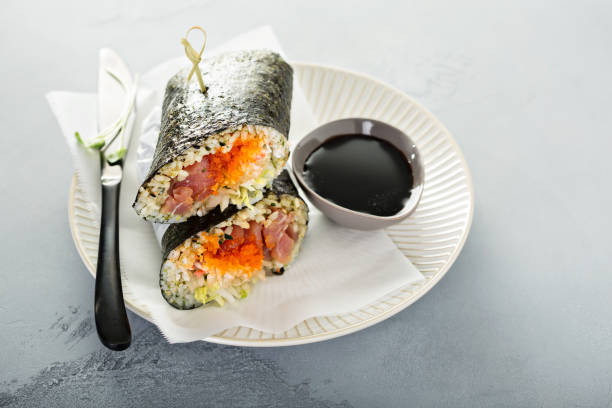 istock Sushi or poke burrito with nori 940523760