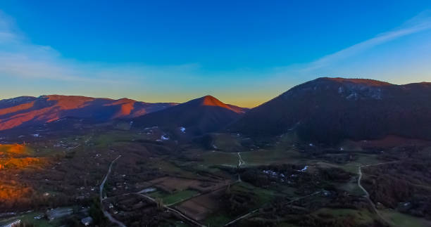 istock Natural landscape with mountains in sunset light. 940524772