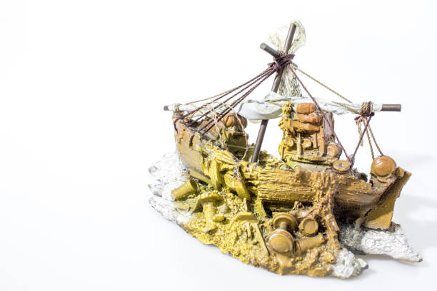 istock Aquarium accessories boat in a white backgorund composition 940525160