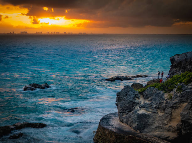 Sunset over a Rocky Coastline stock photo