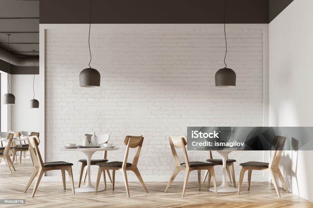 White cafe interior White cafe interior with a wooden floor, round white tables and gray and wooden chairs. 3d rendering mock up Restaurant Stock Photo