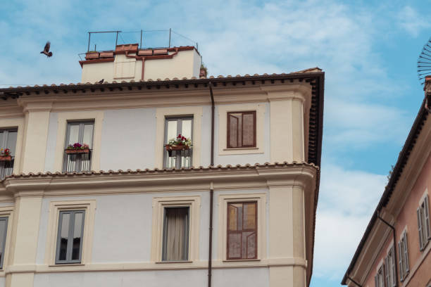 istock Buildings architecture in Rome Italy blue sky summer 940529116