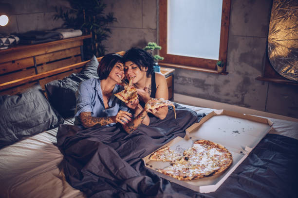 istock Pizza meal in bedroom 940531384