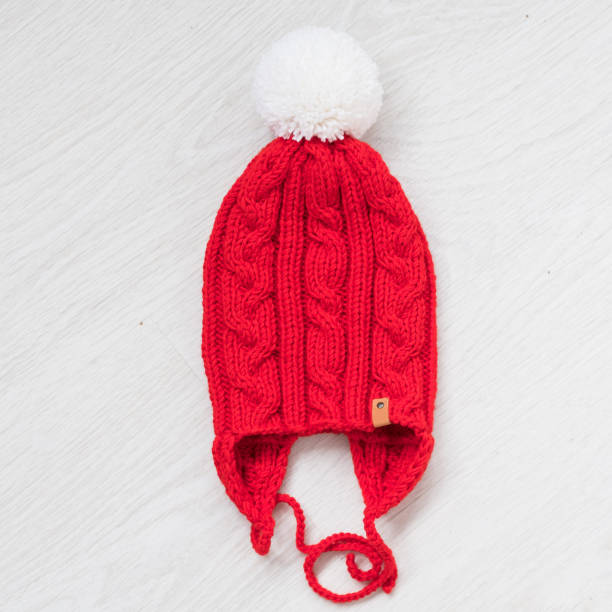 istock cozy knitted winter red hat 940531770