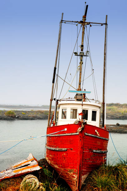 istock Fishing boat on the shore,Homer,Alaska 940532224