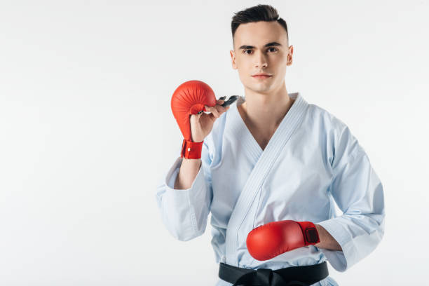 istock male karate fighter with mouthguard isolated on white 940535610
