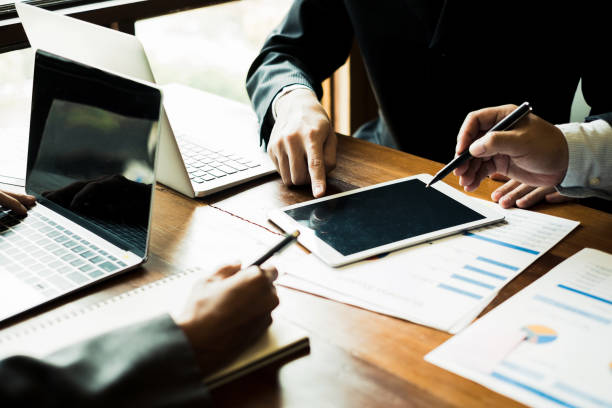 istock business people meeting brainstorming and discussing project together in office, teamwork concept 940539836