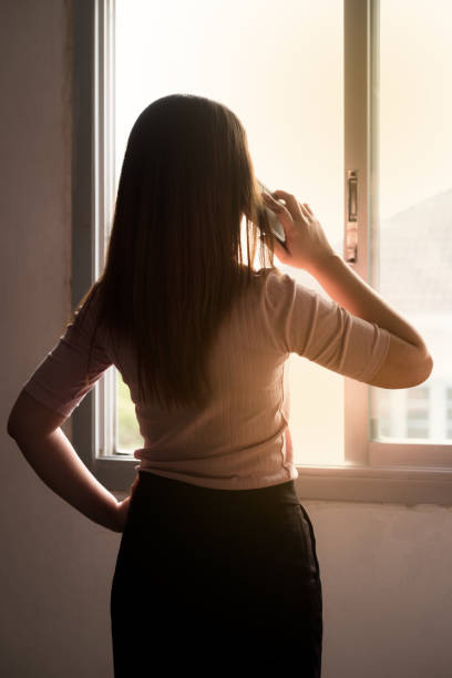 istock working woman and mobile phone 940542564