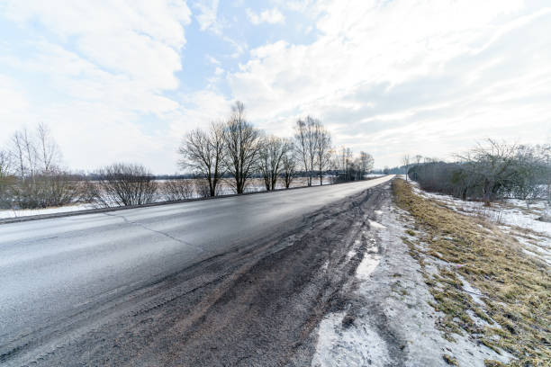 istock snowy winter road covered in deep snow 940543412