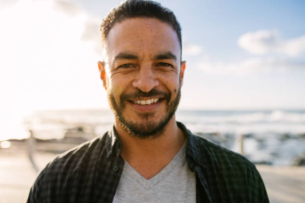 istock Man on vacation standing near the sea 940544106