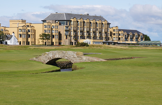 St Andrews - United Kingdom. May 27, 2023: View of the Old Course at St Andrews, featuring the clubhouse against a backdrop of the historic golf course