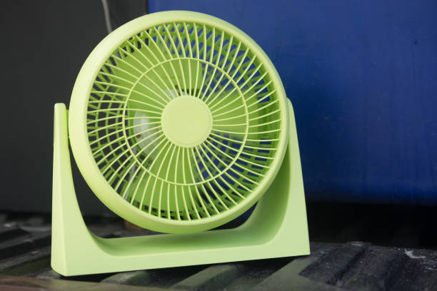 istock Cute small electric fan, green fan 940548690