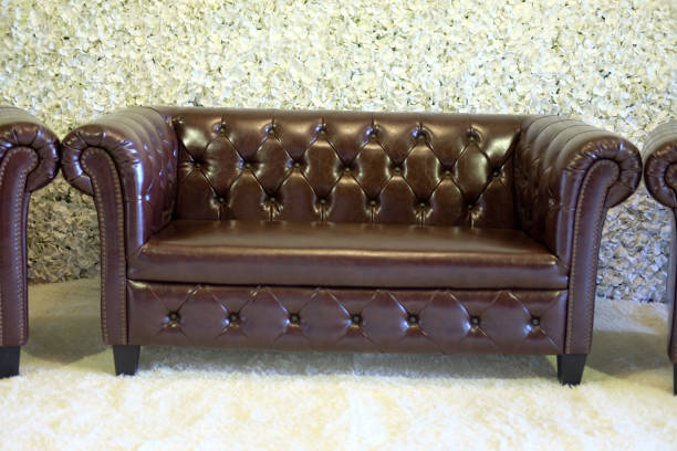 istock Classic brown sofa in wedding with petal flower background 940549214