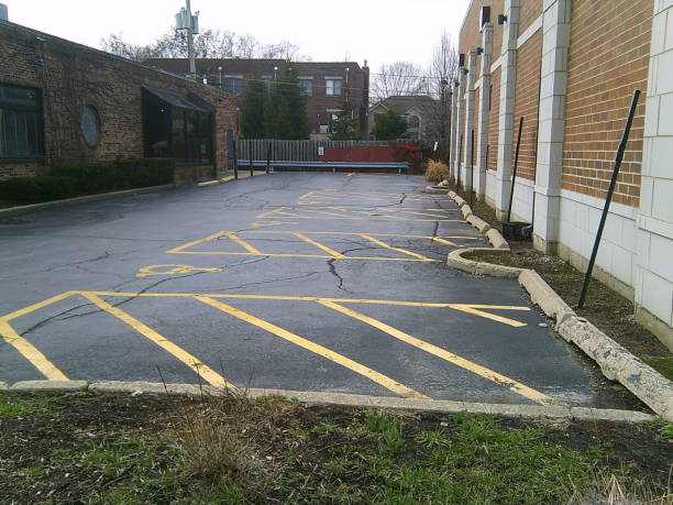 istock Cities and Neighborhoods: Empty Parking Lot 2 940552342
