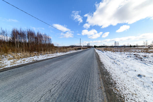 istock snowy winter road covered in deep snow 940555574