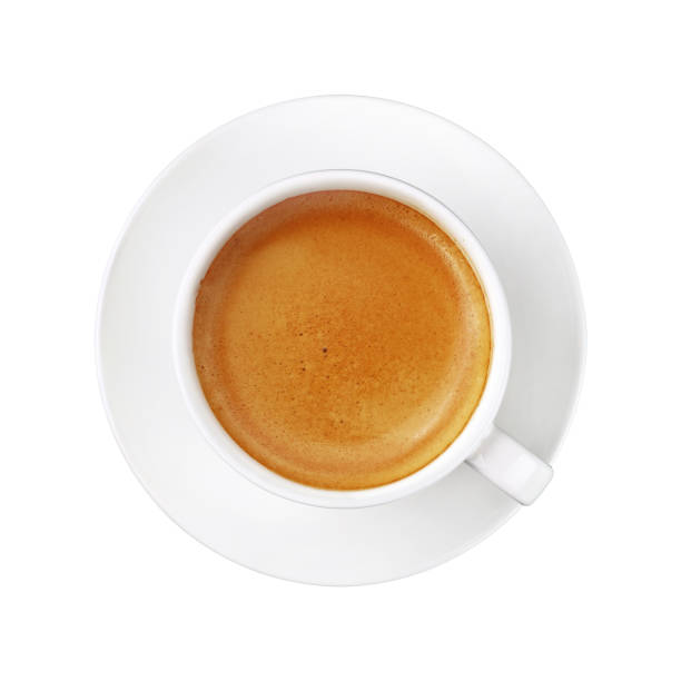 istock White cup of espresso coffee on saucer isolated 940559712